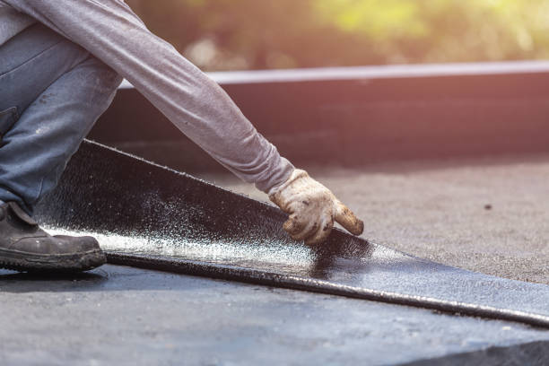 Professional Basement Waterproofing technician working in Lawrenceville, VA
